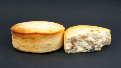 cottage cheese casserole with raisins on a dark background. delicious cheesecake dessert cake close up