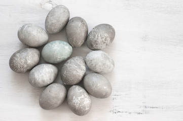 Fototapeta na wymiar Creative unusual grey Easter eggs