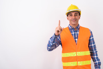 Portrait of mature Persian man construction worker