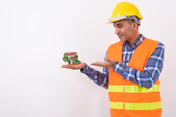 Portrait of mature Persian man construction worker