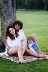 Happy young family in the park