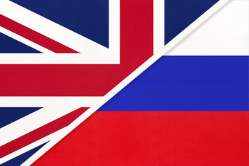 United Kingdom vs Russia national flag from textile. Relationship between two european countries.