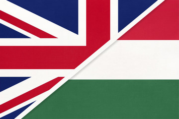 United Kingdom vs Hungary national flag from textile. Relationship between two european countries.