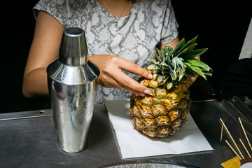 Cooking a cutlet on street close - up at night. Pina colada traditional Caribbean alcoholic cocktail based on light rum, with coconut milk and pineapple juice