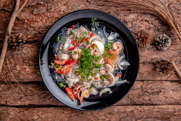 Thai salad with carrot, tomato, glass noodle, celery and pork,