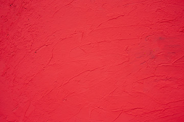 The red background of the wall,Textured background and red lighting