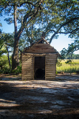 Fototapeta na wymiar Small wooden structure on southern plantation