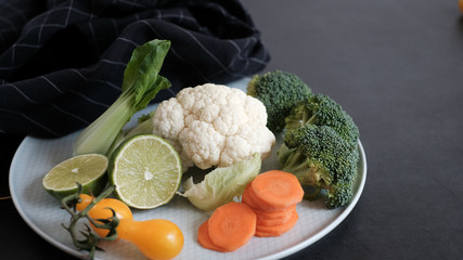 vegan and vegetarian diet healthy food. vegetable decorative on black background