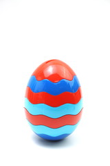 Colorful plastic egg isolated on white background