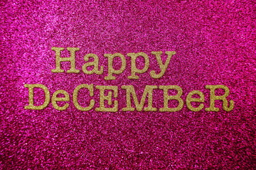Fototapeta na wymiar Happy December alphabet letters on pink glitter background