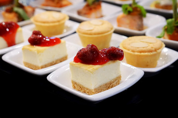 Dessert canapes on black platter