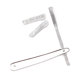 Dangerous razor for cutting hair isolated on a white background