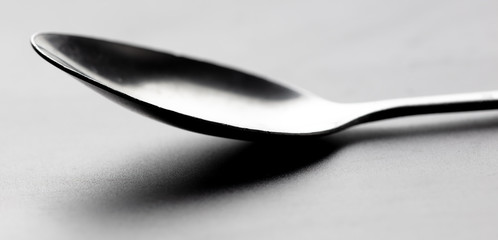 Photo of a spoon with a shadow