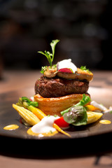 Fillet of Veal topped with Foie Gras. Garnished with vegetable