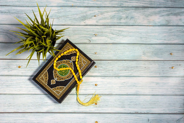 Quran on Wooden Background. Ramadan is coming