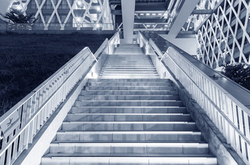 Fototapeta premium Night scene of stairway of modern architecture