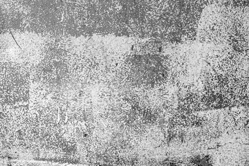 Texture of a metal wall with cracks and scratches which can be used as a background