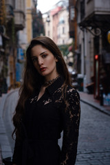 Beautiful woman walks at Istiklal street,a popular location in Istanbul