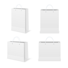 Paper shopping bags collection. Empty cardboard packet on white background.