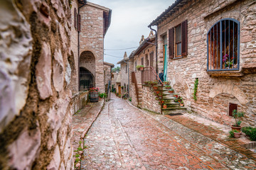 Narrow street with brick walls in a town