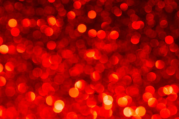 Red abstract background with bokeh defocused lights