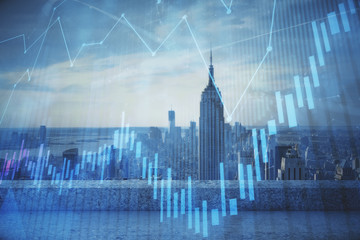 Obraz na płótnie Canvas Forex graph on city view with skyscrapers background multi exposure. Financial analysis concept.
