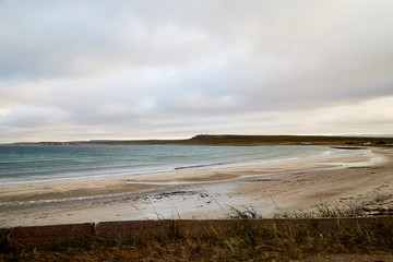 Norway landscape with beach of the Northern sea in cloudy weather