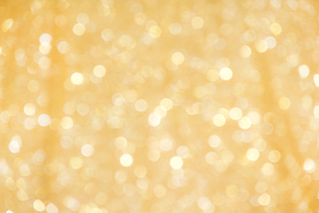 Fototapeta na wymiar Gold yellow sparkle bokeh glitter abstract on christmas light background