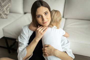little baby in mom's arms