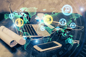 Financial graph colorful drawing and table with computer on background. Multi exposure. Concept of international markets.