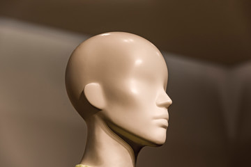 mannequin head Head of a white mannequin at store background