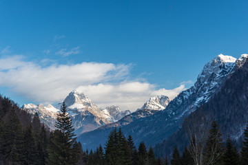 Fototapeta premium Mount Mangart from the Predil pass in winter clothes. Tarvisio, Italy