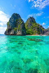 Tropical Shimizu Island and paradise beach, El Nido, Palawan, Philippines. Tour A Route. Coral reef...