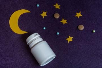 Sky with moon and stars. The concept of sleeping pills
