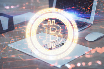 Double exposure of blockchain theme hologram and table with computer background. Concept of bitcoin...