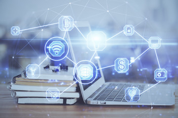 Computer on desktop with social network theme icon. Multi exposure. Concept of international connections.