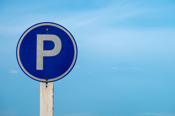 sign parking on blue sky background