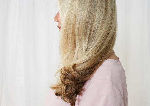 Close Up Of A Senior Woman With Her Lovely Long Blonde Hair