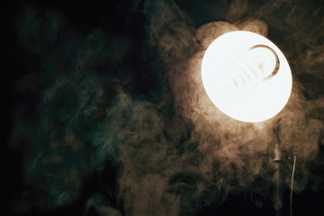 Lamp and steam as industrial background