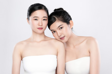 Portrait Two beautiful young asian woman clean fresh bare skin concept.  Asian girl beauty face skin care and health wellness, Facial treatment, Perfect skin, Natural make up, on white background