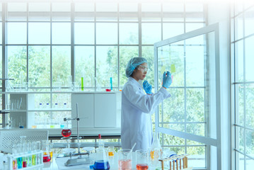 science medical study phamasutical medicine lab in hospital. scientist doing some research vaccine anti virus sample.technology medical of chemist  scientist working with microscope ware glass safty.
