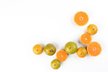 small yellow green mandarin orange whole slice on white background copy space for text frame border