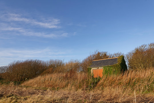An old Railway building on an Embankment of a dismantled Coastal Railway line that used to run through the Fishing Village of Johnshaven.