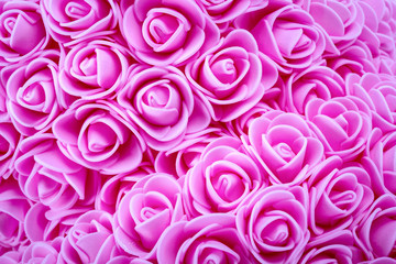 Pink synthetic roses background