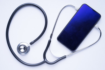 Phone after sales service, repair, maintenance concept. Smartphone being diagnosed with a...