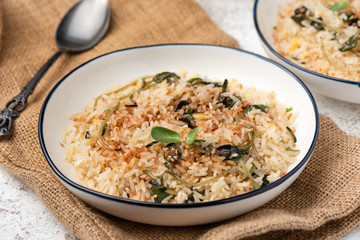 fired rice with vegetable on white backdrop