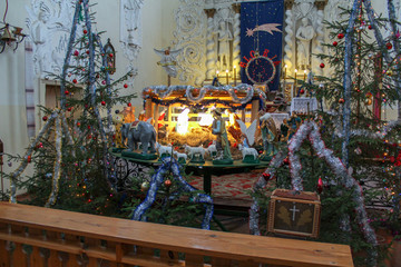 Christmas composition with figures in the Church