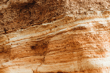 Natural red stone texture for wallpaper. Closeup horizontal background