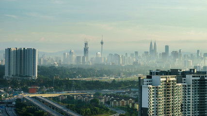Morning mist with a view of Kuala Lumpur city.