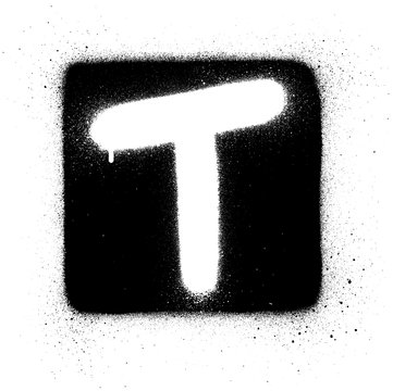 graffiti T font sprayed in white over black square